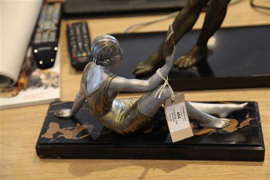 Chiparus. A painted bronze figure of a lady, The Reader, H. 8.5in.